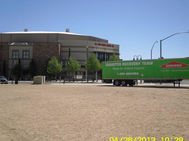 SERVPRO truck outside commercial building. 