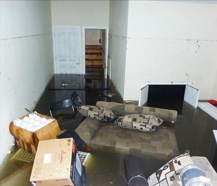Completely flooded basement in Prescott Valley, AZ. A visible line is showing maximum water level higher than 7 feet.