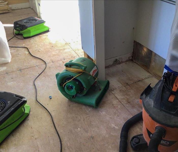 Removed materials and air movers set up in a Prescott, AZ home